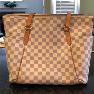 White Louis Vuitton purse